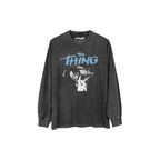 Black long-sleeve shirt with 'The Thing' graphic design on a white background